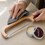 Applying the wood balm to the beech frame with the polishing cloth